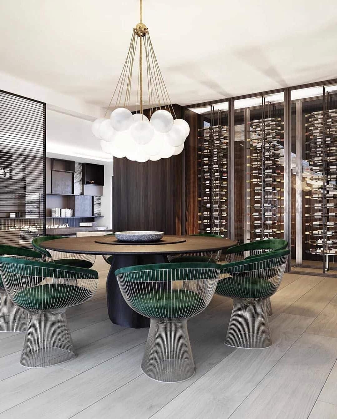 Gorgeous dining room designed with a wine wall display as a backdrop ...